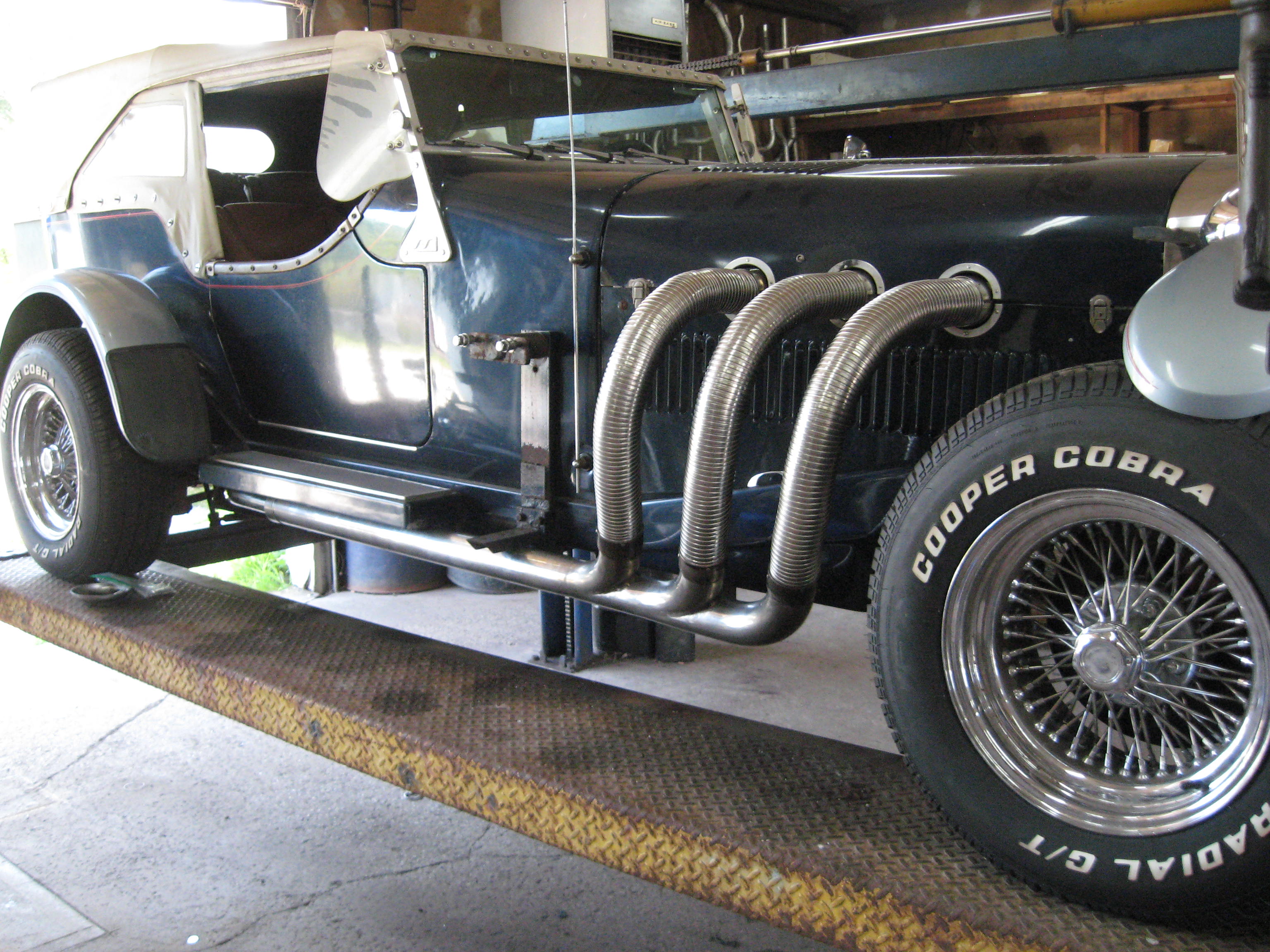 Automotive Exhaust Specialists work